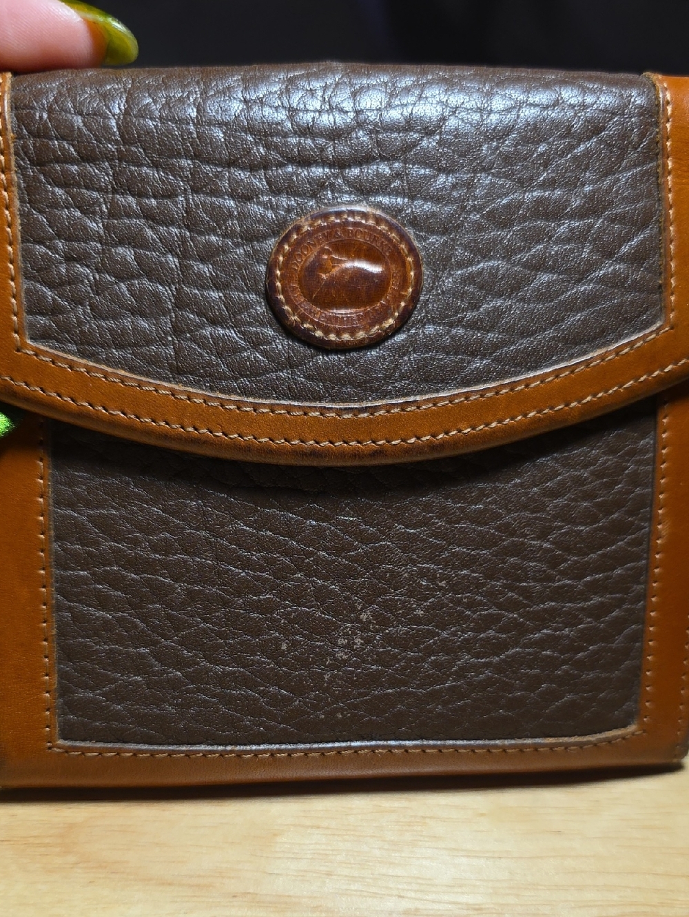 Dooney & Bourke Dark Brown Pebbled Leather Wallet with Tan Trim